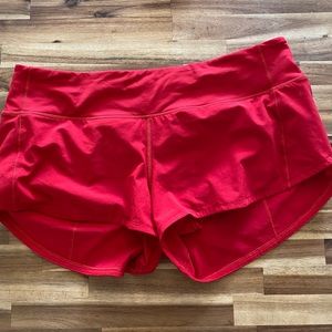 Red Lululemon hotty hot shorts, size 8